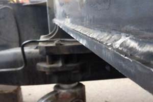 Arc Air Gouging and rewelding of cracked chassis of wheeled excavator